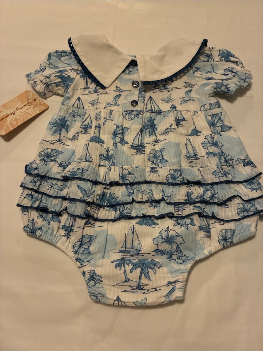 Tommy Bahama Blue & White Sailboat Print Infant One-Piece with Navy Bow - Picture 5 of 6